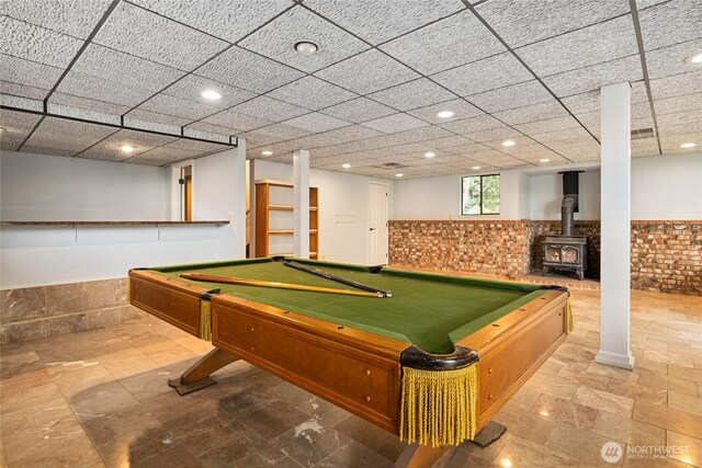 7650 SE Southworth Dr, Port Orchard, WA 98366 - game room with wainscoting, a wood stove, billiards, and recessed lighting