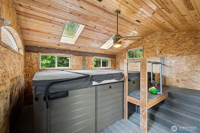 7650 SE Southworth Dr, Port Orchard, WA 98366 - bedroom with lofted ceiling, wood ceiling, a skylight, and wood finished floors