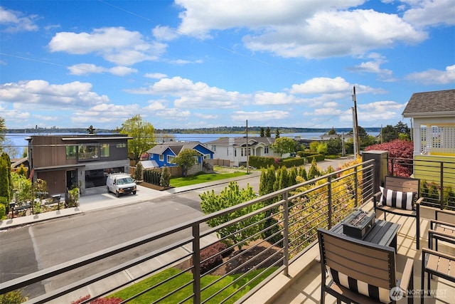 212 5th Ave W, Kirkland, WA 98033 - balcony featuring a water view and a residential view
