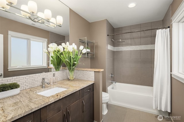 212 5th Ave W, Kirkland, WA 98033 - bathroom featuring vanity, toilet, shower / tub combo with curtain, tasteful backsplash, and recessed lighting