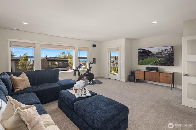 212 5th Ave W, Kirkland, WA 98033 - living area featuring light colored carpet, recessed lighting, and baseboards