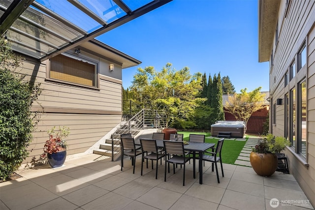 212 5th Ave W, Kirkland, WA 98033 - view of patio featuring outdoor dining space, a hot tub, grilling area, a pergola, and stairway