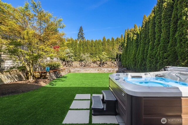212 5th Ave W, Kirkland, WA 98033 - view of yard with a hot tub and a view of trees