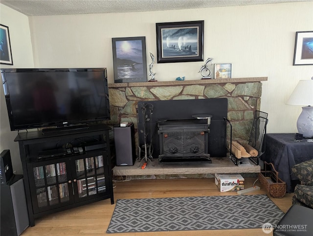 22894 Carmella Rd NW, Poulsbo, WA 98370 - living area with wood finished floors and a textured ceiling