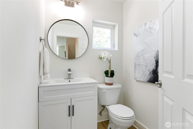 6816 NE 153rd Pl Unit D, Kenmore, WA 98028 - half bath with vanity, toilet, and baseboards