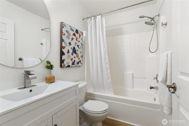 6816 NE 153rd Pl Unit D, Kenmore, WA 98028 - full bathroom featuring vanity, toilet, and shower / bathtub combination with curtain