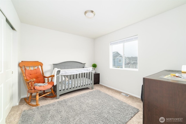15177 Prescott Loop SE, Yelm, WA 98597 - carpeted bedroom with baseboards and a closet