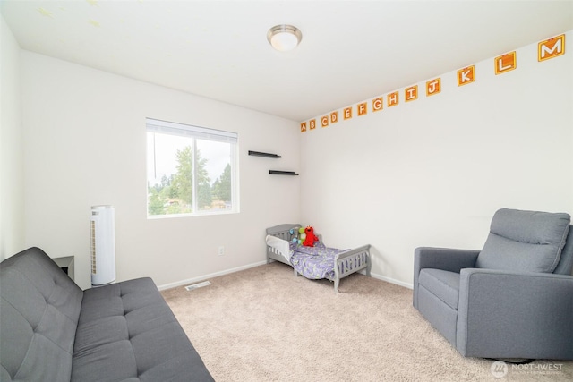 15177 Prescott Loop SE, Yelm, WA 98597 - sitting room with carpet flooring and baseboards