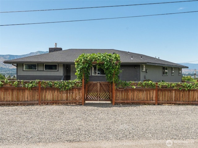 2540 N Astor Ave, East Wenatchee, WA 98801 - ranch-style home featuring a chimney and a mountain view