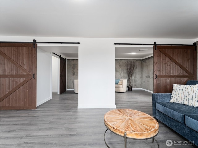 2540 N Astor Ave, East Wenatchee, WA 98801 - living room featuring a barn door and wood finished floors