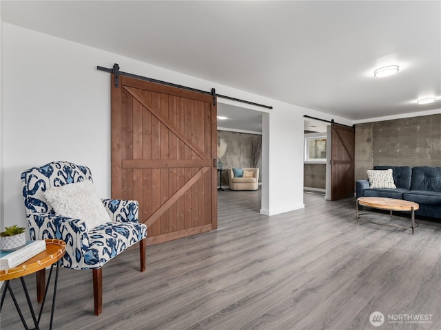 2540 N Astor Ave, East Wenatchee, WA 98801 - living area featuring a barn door and wood finished floors