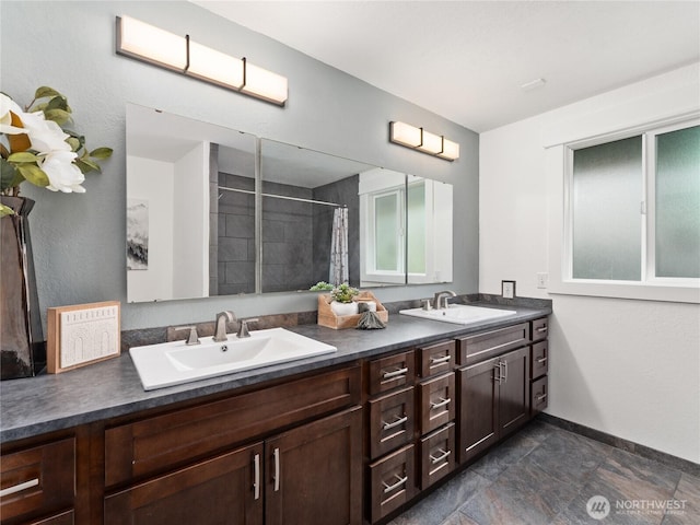 2540 N Astor Ave, East Wenatchee, WA 98801 - bathroom featuring double vanity and tiled shower