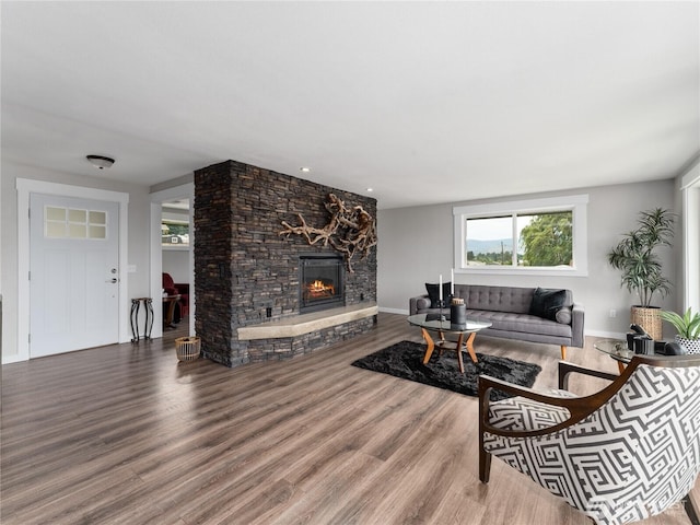 2540 N Astor Ave, East Wenatchee, WA 98801 - living room featuring a stone fireplace, wood finished floors, and recessed lighting
