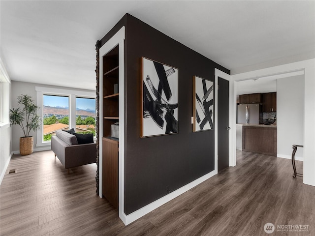 2540 N Astor Ave, East Wenatchee, WA 98801 - hallway with dark wood-style floors and baseboards