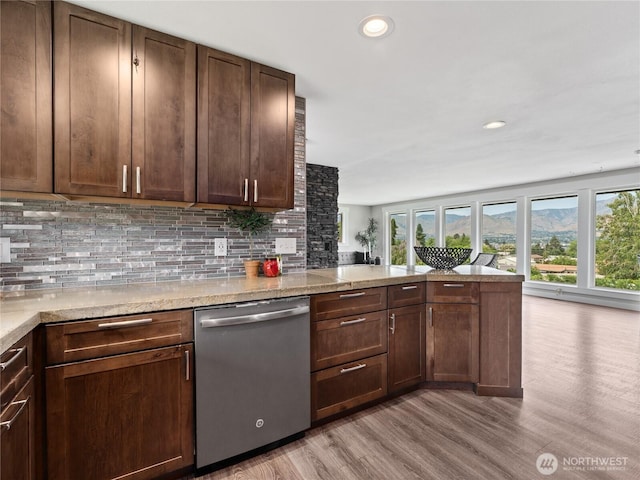 2540 N Astor Ave, East Wenatchee, WA 98801 - kitchen featuring dishwasher, light wood-type flooring, decorative backsplash, a peninsula, and recessed lighting
