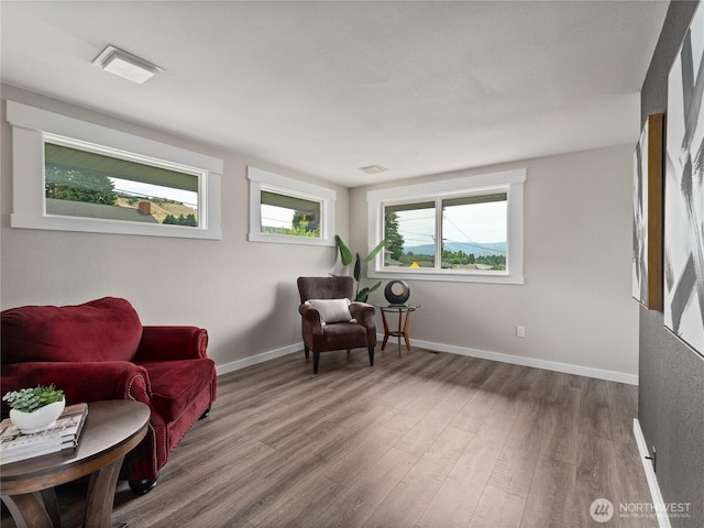 2540 N Astor Ave, East Wenatchee, WA 98801 - living area featuring wood finished floors and baseboards