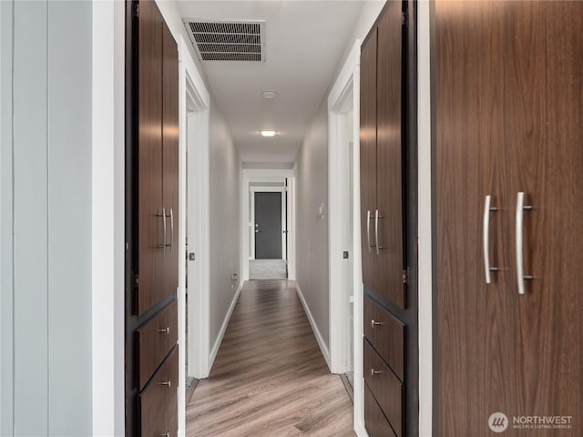 2540 N Astor Ave, East Wenatchee, WA 98801 - hallway featuring baseboards and light wood-type flooring