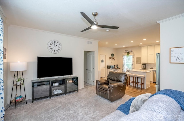 170 E Soundview Dr E, Shelton, WA 98584 - living area with a ceiling fan, crown molding, recessed lighting, and light colored carpet