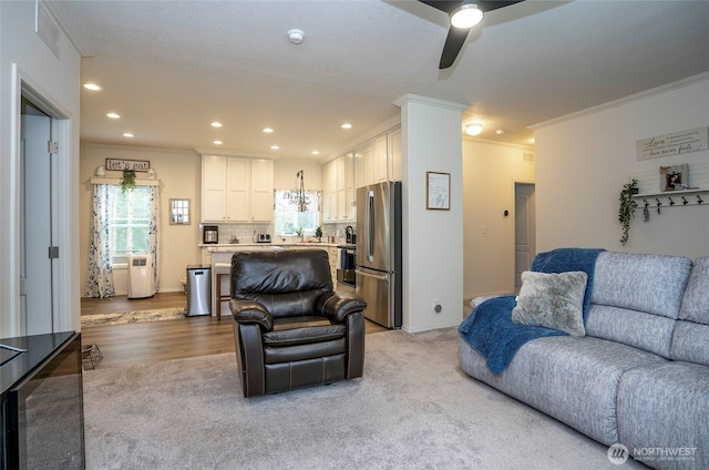170 E Soundview Dr E, Shelton, WA 98584 - living area featuring crown molding, ceiling fan, recessed lighting, and light wood-style flooring