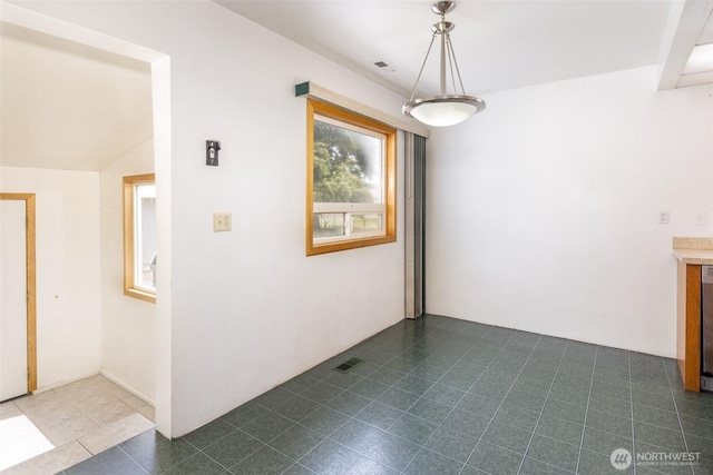 819 1st St, Cle Elum, WA 98922 - unfurnished dining area featuring dark tile patterned flooring