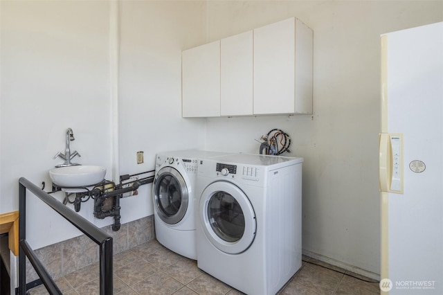 819 1st St, Cle Elum, WA 98922 - laundry room with independent washer and dryer and light tile patterned flooring