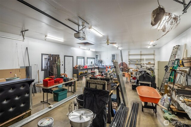 819 1st St, Cle Elum, WA 98922 - garage with a garage door opener and a workshop area