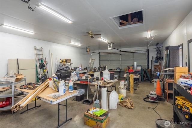 819 1st St, Cle Elum, WA 98922 - garage featuring freestanding refrigerator, a garage door opener, and a ceiling fan