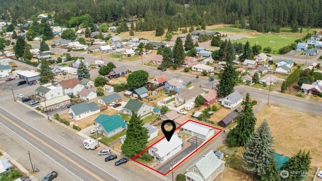 819 1st St, Cle Elum, WA 98922 - aerial view of residential area featuring a forest and property parcel outlined