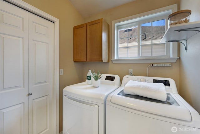 2643 NW 57th St Unit A, Seattle, WA 98107 - washroom featuring washer and dryer and cabinet space