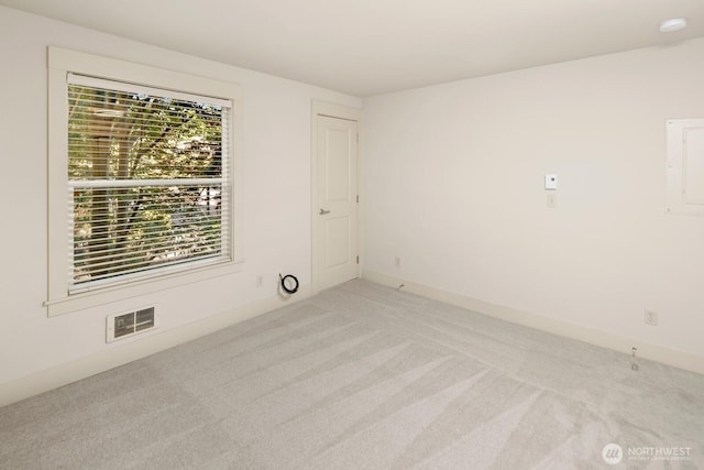 22910 90th Ave W Unit B306, Edmonds, WA 98026 - empty room featuring light carpet and electric panel