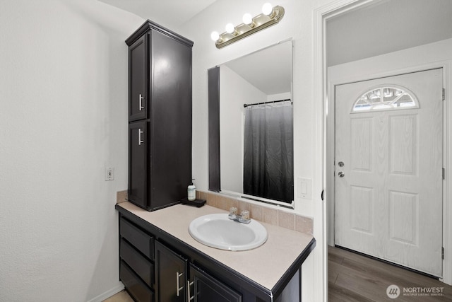 7311 Chambers Creek Rd W Unit 28, University Place, WA 98467 - bathroom featuring vanity and wood finished floors