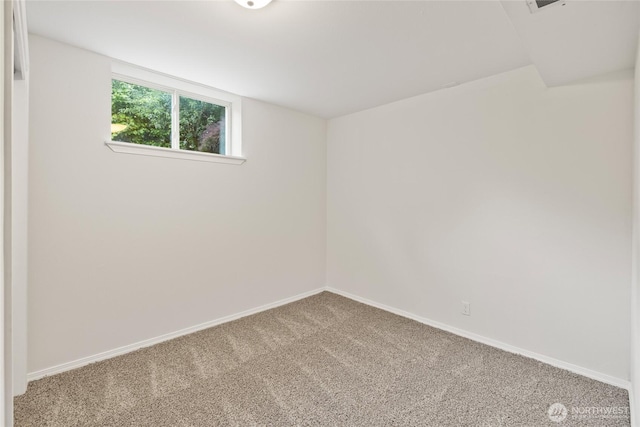 1003 9th St NW, Puyallup, WA 98371 - carpeted empty room with baseboards