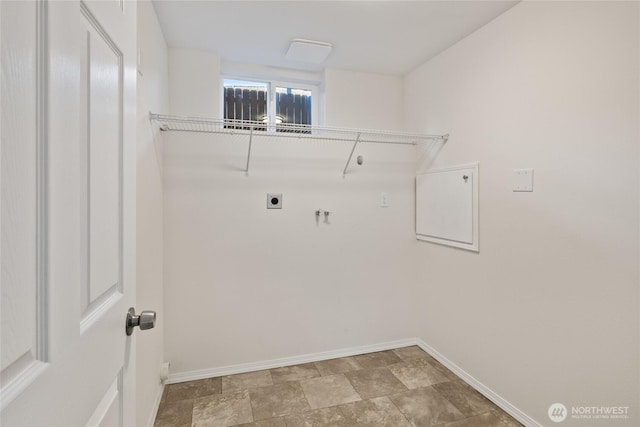 1003 9th St NW, Puyallup, WA 98371 - washroom featuring hookup for an electric dryer, hookup for a washing machine, and stone finish floors