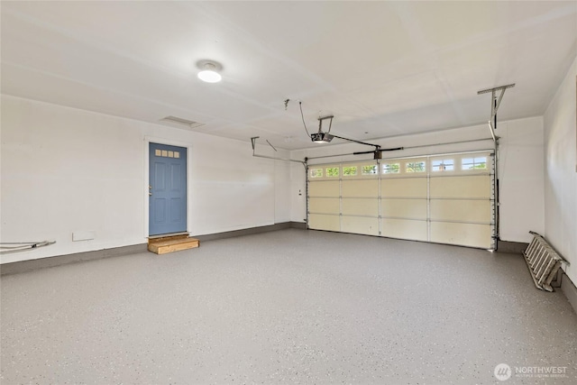 1003 9th St NW, Puyallup, WA 98371 - garage with a garage door opener
