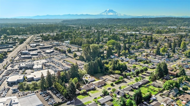1003 9th St NW, Puyallup, WA 98371 - aerial overview of property's location featuring mountains