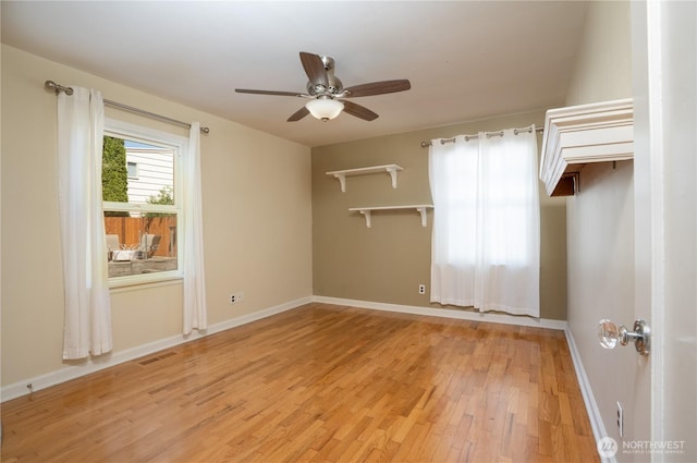 1016 N Madison St, Tacoma, WA 98406 - unfurnished bedroom featuring light wood-style floors and a ceiling fan