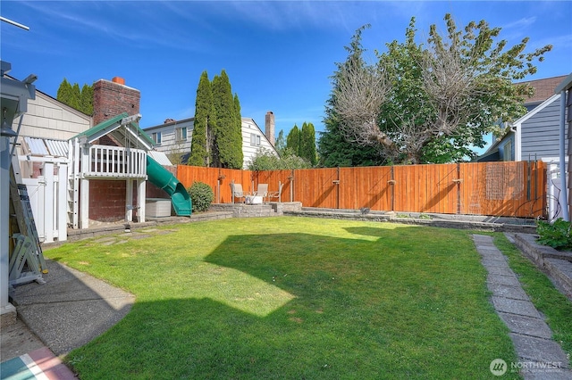 1016 N Madison St, Tacoma, WA 98406 - fenced backyard with a playground