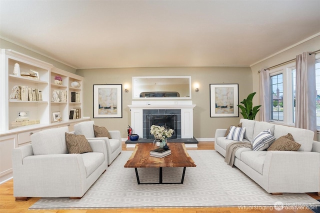 1016 N Madison St, Tacoma, WA 98406 - living room featuring light wood finished floors and a fireplace