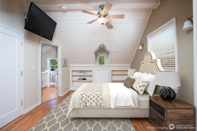1016 N Madison St, Tacoma, WA 98406 - bedroom with lofted ceiling, wood finished floors, and a ceiling fan