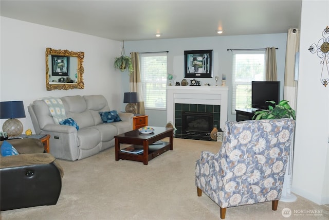 3081 Wild Goose Rd NE, Moses Lake, WA 98837 - carpeted living area with healthy amount of natural light and a tiled fireplace