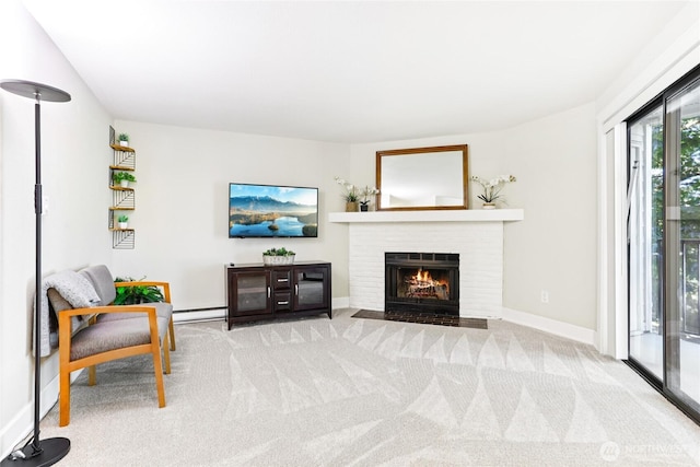 12505 NE 116th St Unit A26, Kirkland, WA 98034 - carpeted living room with a fireplace and baseboard heating