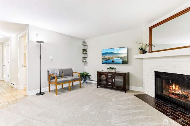 12505 NE 116th St Unit A26, Kirkland, WA 98034 - living area featuring a brick fireplace, carpet floors, and baseboard heating