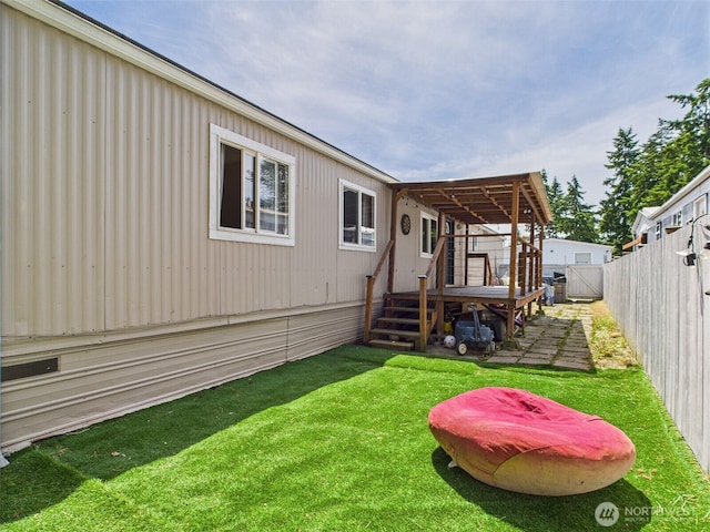 3001 S 288th St Unit 85, Federal Way, WA 98003 - fenced backyard featuring a wooden deck