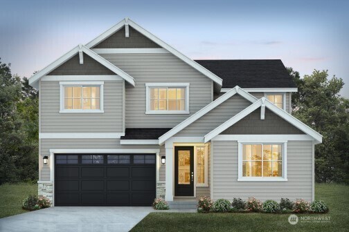 9036 71st Avenue Ct E, Puyallup, WA 98371 - craftsman house with concrete driveway and an attached garage