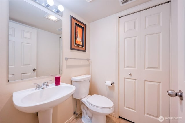 16219 Northup Way Unit C-202, Bellevue, WA 98008 - half bath with a sink and toilet