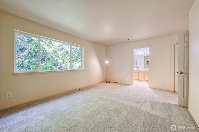 16219 Northup Way Unit C-202, Bellevue, WA 98008 - empty room with carpet flooring and baseboards