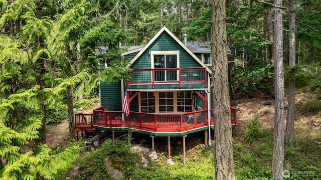 1026 Chinook Way, Center Island, WA 98221 - back of house featuring a wooden deck and a balcony
