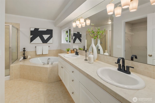 11734 167th Ct NE, Redmond, WA 98052 - bathroom with crown molding, a shower stall, double vanity, a garden tub, and a spacious closet