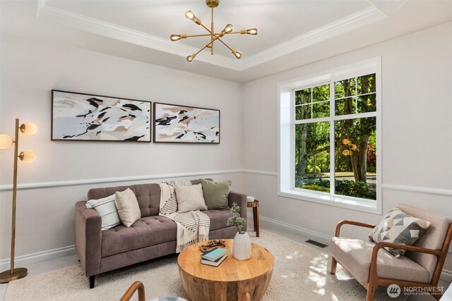 11734 167th Ct NE, Redmond, WA 98052 - living room with a tray ceiling, crown molding, and a chandelier