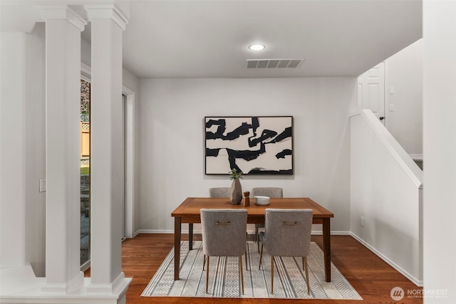 11734 167th Ct NE, Redmond, WA 98052 - dining space with wood finished floors and decorative columns